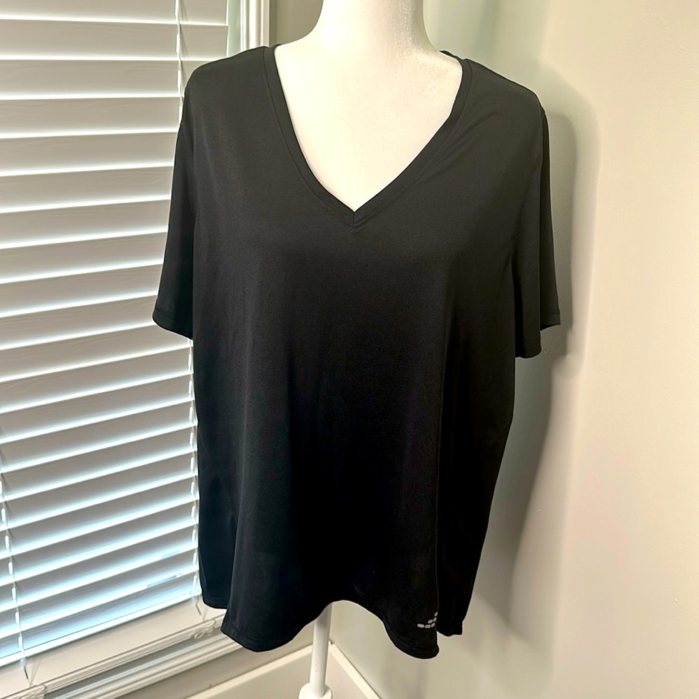 Bcg Women’s workout black shirt. 100% polyester Egypt machine wash & tumble dry.